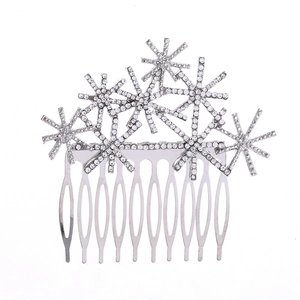 Silver snowflake hair comb with sparkling crystals for bridal styling and party accessories