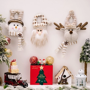 Christmas hanging plush toys featuring Santa, Snowman, and Reindeer in festive home decor