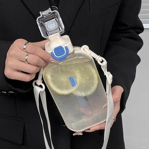 Minimalist square plastic water bottle with adjustable strap and lemon slices inside