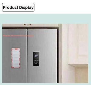 Detailed view of strawberry magnetic notepad attached to a refrigerator door