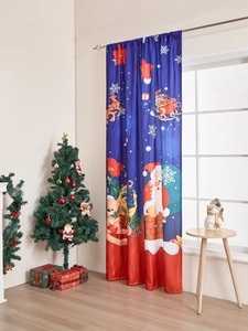 Close-up of blue Christmas curtain featuring Santa Claus and reindeer print details