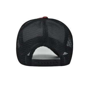Detail of the breathable black mesh back and snapback closure on a plaid baseball cap