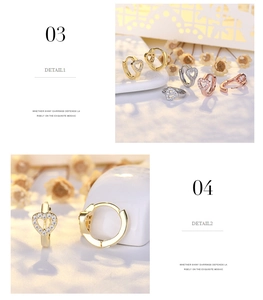 Detailed view of heart hoop earrings with micro-set cubic zirconia in multi-color finishes