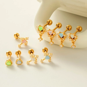 Golden stainless steel cartilage earrings with heart, cross, and opal stone screw backs