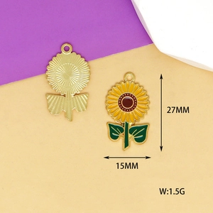 Detail of enamel sunflower pendant with dimensions showing height 27mm and width 15mm