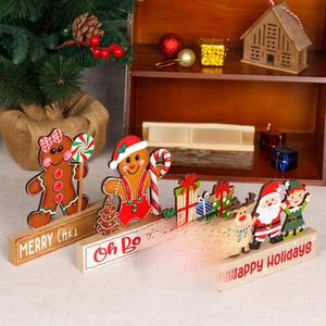 Christmas wooden tabletop decor set featuring gingerbread man and Santa Claus figures
