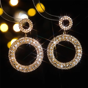 Boucles d'oreilles pendantes géométriques circulaires avec strass étincelants