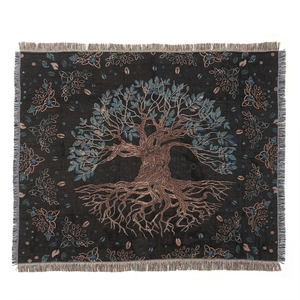 Bohemian woven Tree of Life outdoor camping blanket with elegant fringe tassels on white background