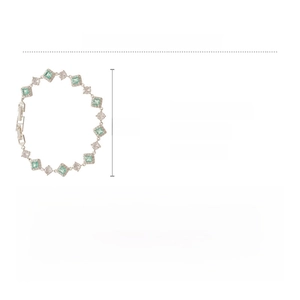 Macro detail of 20cm silver chain bracelet with green and white cubic zirconia stones