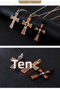 Detailed view of multilayer cross pendants in silver, gold, and black with wood inlay