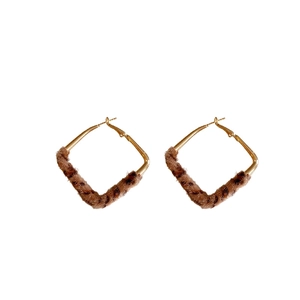 Rhombic leopard print plush earrings with gold metal frame and silver needles