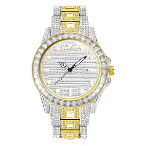 Detailed macro view of gold-silver tone watch featuring a rainbow diamond bezel and calendar
