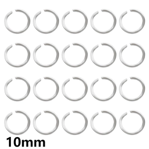 Detailed view of twenty 10mm silver metal open jump rings for DIY jewelry making