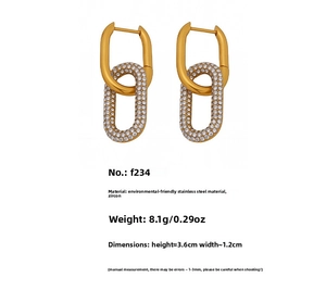 Détail des boucles d'oreilles ovales en acier doré avec pavé de zircons et dimensions