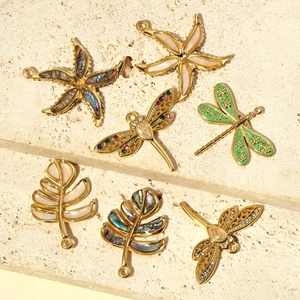 French style gold titanium steel pendants with dragonfly starfish and shell inlay details