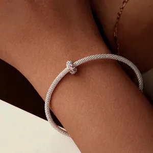 Elegant s925 silver mesh bracelet with rose gold flower charm and cubic zirconia stones