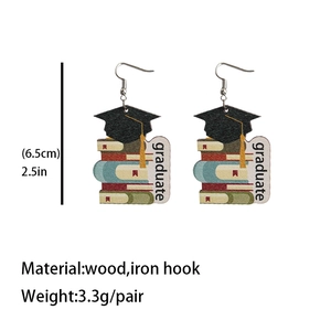 Detail showing graduation hat earrings dimensions of 6.5cm and lightweight wood material
