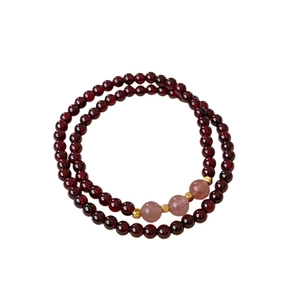 Double-layer garnet and strawberry quartz bracelet with golden metal spacers for women