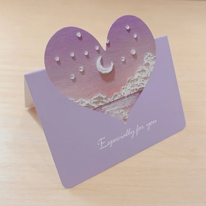 Macro detail of purple 3D oil painting heart card with moon and sea texture
