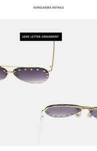 Detail of purple gradient lenses with gold rivet studs on metal semi-rimless sunglasses