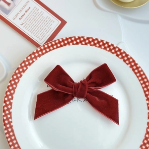 Burgundy velvet bow cake topper decoration for Christmas dessert display with greeting card