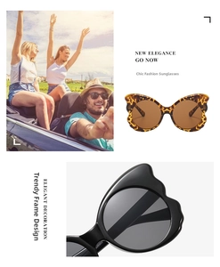 Macro detail of tortoiseshell butterfly frame and black wavy edge fashion sunglasses