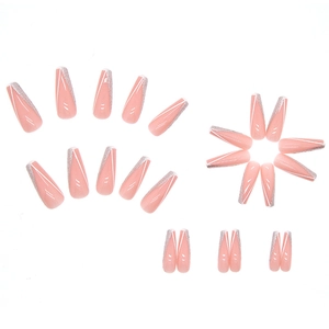 Long ballerina press-on nails with nude pink base, silver glitter tips and white lines