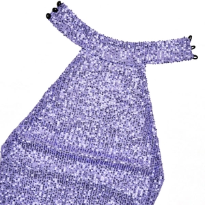 Detailed view of purple sequin halter neck top featuring shimmering texture and button details