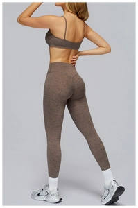 Close-up of brushed heather brown yoga set showing high waist leggings and sports bra texture