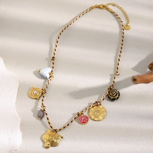 Braided multi-pendant necklace with 18K gold tiger head, heart coin and mixed gemstones