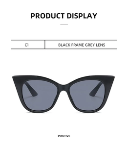 Front view of stylish black cat eye sunglasses featuring polished frames and grey lenses