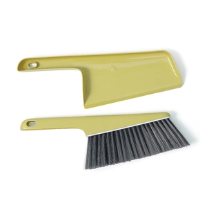 Mini desktop broom and dustpan set in olive green for efficient home cleaning