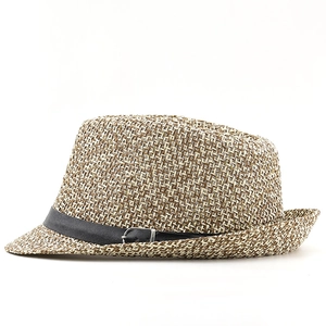 Close-up of British style Panama hat showing tight weave texture and black decorative band