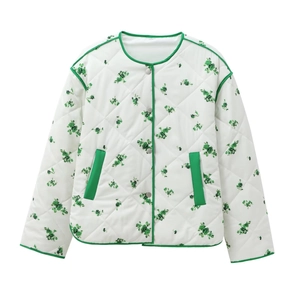 Women's white floral quilted jacket with green trim and metal buttons in a flat lay view