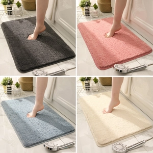 Thick microfiber bathroom rugs in four colors with non-slip backing for shower use