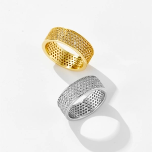 Sparkling wide band eternity rings with micro-pave crystals in gold and silver finishes