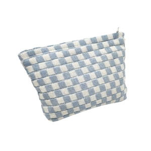 Blue and white checkered knitted cosmetic bag with zipper on a white background