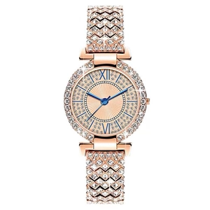 Luxurious rose gold women's watch featuring a full crystal pavé dial and geometric band