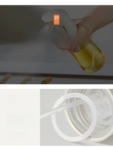 Dettaglio macro dello spruzzatore d'olio in vetro con anello di tenuta in silicone
