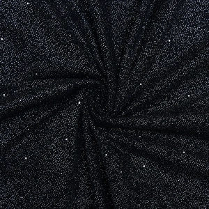 Macro shot of black fabric with silver glitter detail on an elegant evening gown