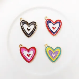 Colorful enamel heart pendants in multiple colors with gold metal edges for DIY jewelry