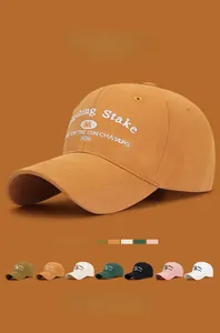 Detailed embroidery on vintage cotton baseball cap with adjustable curved brim and color options