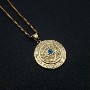 Golden Eye of Horus necklace in stainless steel with Egyptian symbols and a blue stone