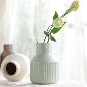 Vertical striped ceramic flower vases in light green and cream for Nordic home decor