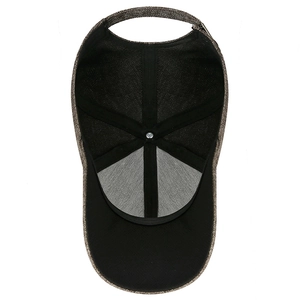 Inside view of structured six-panel baseball cap with mountain peak metal logo detailing