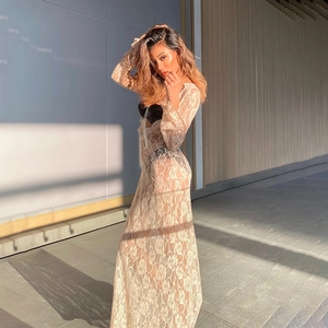 Sheer lace long sleeve dress in beige featuring a U-neck and delicate floral embroidery