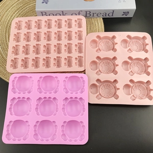 Three-piece silicone mold set featuring pink crab, large turtle, and purple crab shapes