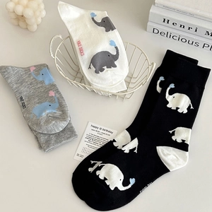 Three pairs of cotton crew socks with cute elephant patterns in white, grey and black colors