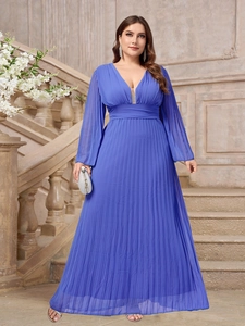 Detail of elegant navy blue V-neck pleated maxi dress with fine chiffon texture