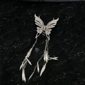 Silver butterfly hair claw clip with long tassel chains and metallic wing details